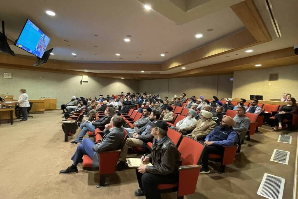 Members of the Gurdwara Guru Amardas Darbar Sikh Society and the public listen as Kelowna council debates a rezoning request for 2809 Benvoulin Road where the society plans to build a new temple. (Gary Barnes/Capital News)