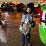 The Grinch reluctantly poses for a snap in Langford&rsquo;s Veterans Memorial Park. (Ben Fenlon/Goldstream Gazette)