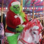 The Grinch test drives the carousel in Langford&rsquo;s Veterans Memorial Park. (Ben Fenlon/Goldstream Gazette)