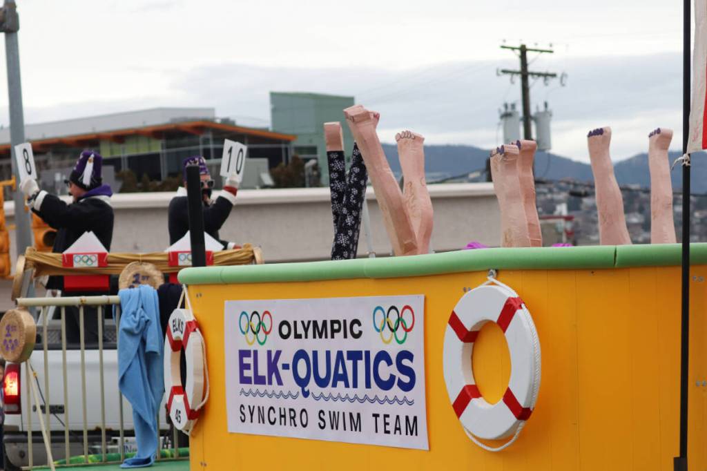 The synchronized swimming team boasted a fantastic float, featuring feet sticking up from the pool. (Brendan Shykora/Morning Star)
