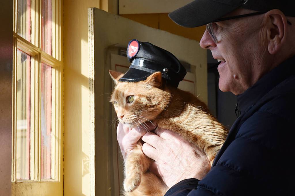 Whonnock resident Paul Stanley holds Sid, the honorary postmaster for the Whonnock Post Office. (Colleen Flanagan/The News)